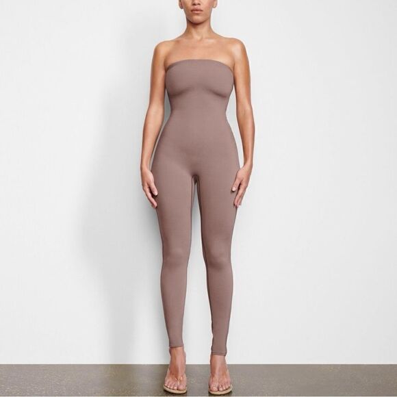 SKIMS All-In-One Strapless Onesie in Umber - Picture 1 of 8